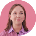 Portrait of a woman against pink background