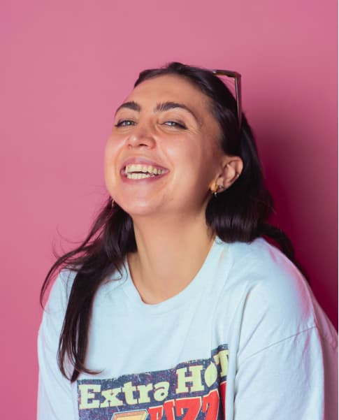 Woman closeup posing - turquoise background