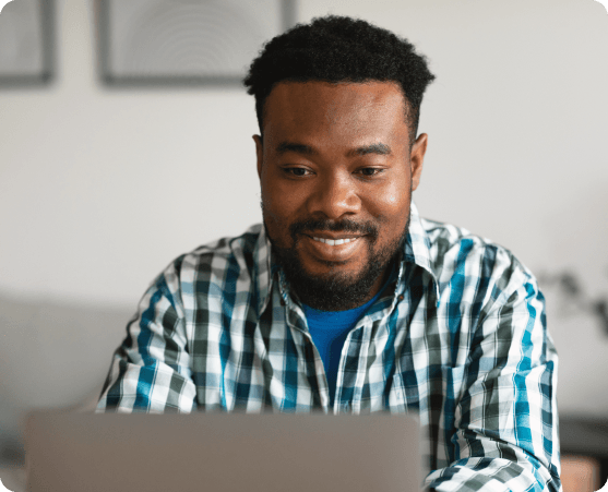 Man working on laptop.