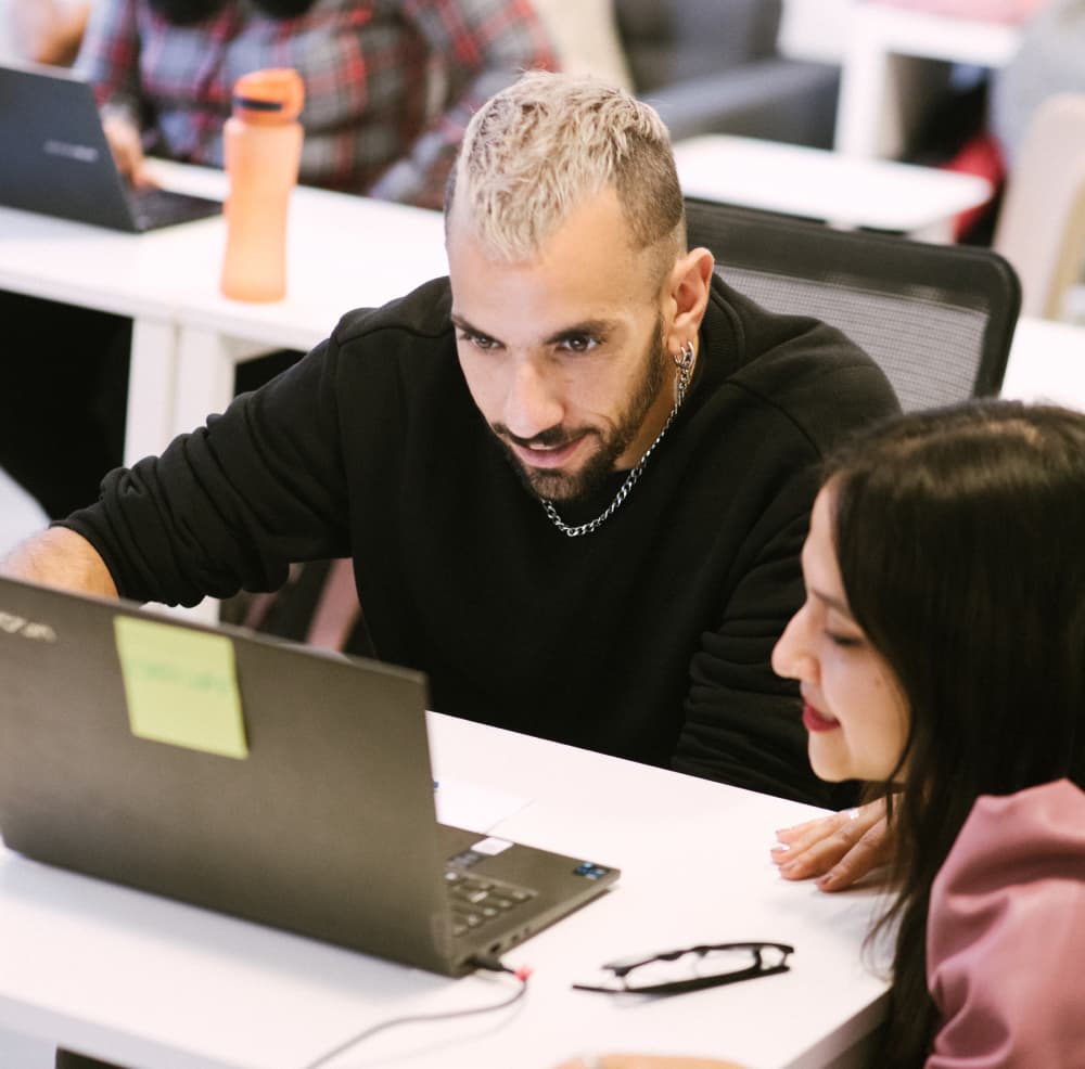 Two people in a classroom